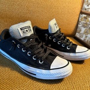 Black and glittery silver converse